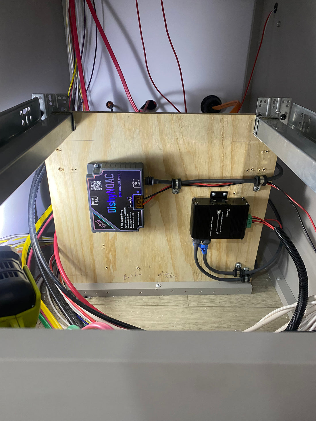 Solar panel, power station, inverter, monitor, distribution block, and cabling for a mobile off-grid power system